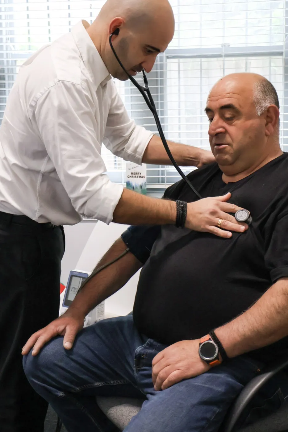 Doctor Billy Stoupas in a clinical education setting